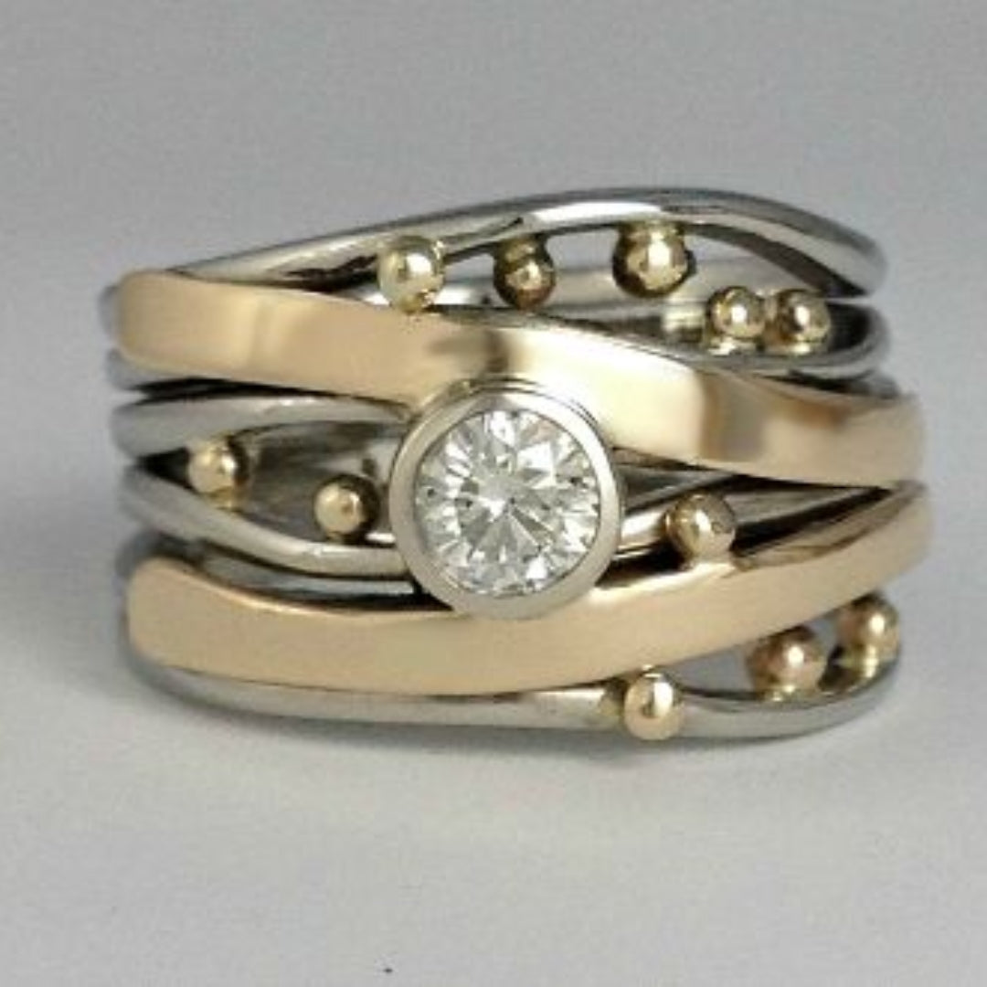 Zlatý a stříbrný prsten s vintage zirkonem